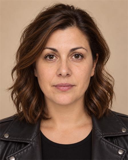 The same person with more hair volume around the face